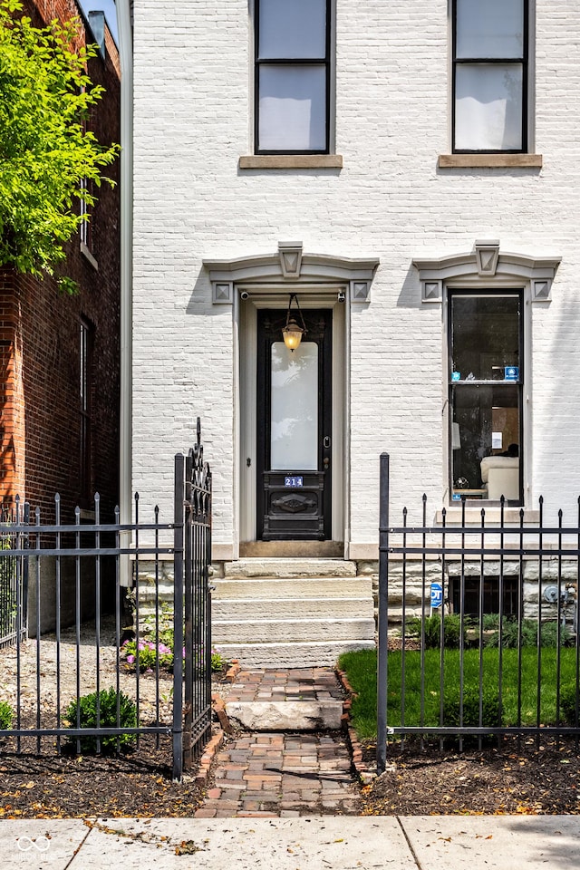 214 E St Joseph St, Indianapolis, IN 46202 - view of exterior entry with brick siding