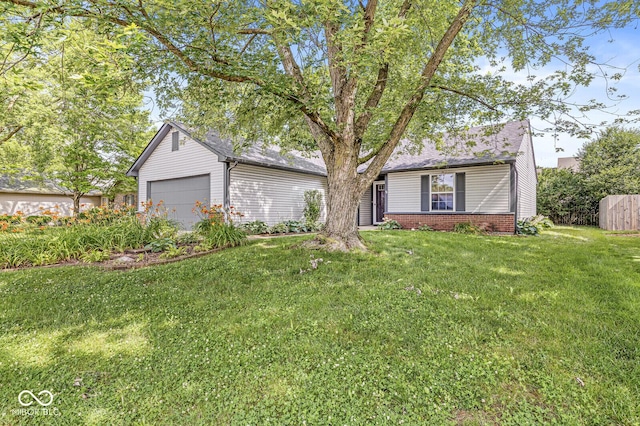1540 Brook Pointe Dr, Indianapolis, IN 46234 - view of front facade with an attached garage, a front yard, and brick siding