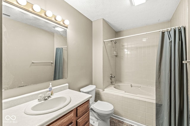 1540 Brook Pointe Dr, Indianapolis, IN 46234 - bathroom with tiled shower / bath combo, vanity, a textured ceiling, and tile patterned floors