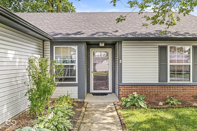 1540 Brook Pointe Dr, Indianapolis, IN 46234 - doorway to property featuring a shingled roof and brick siding
