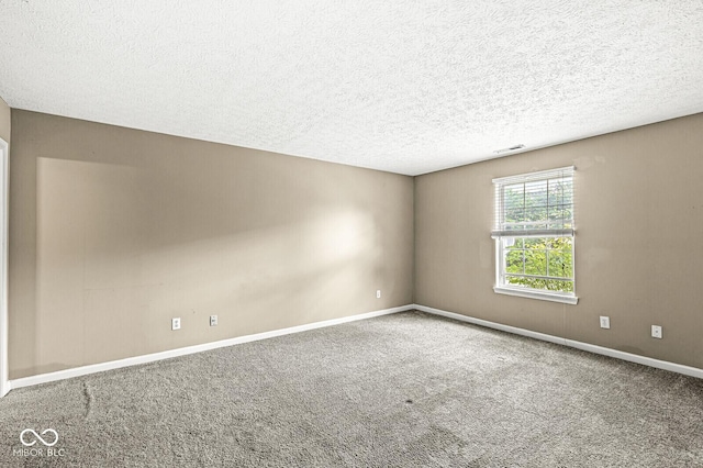 1540 Brook Pointe Dr, Indianapolis, IN 46234 - spare room featuring carpet floors and a textured ceiling
