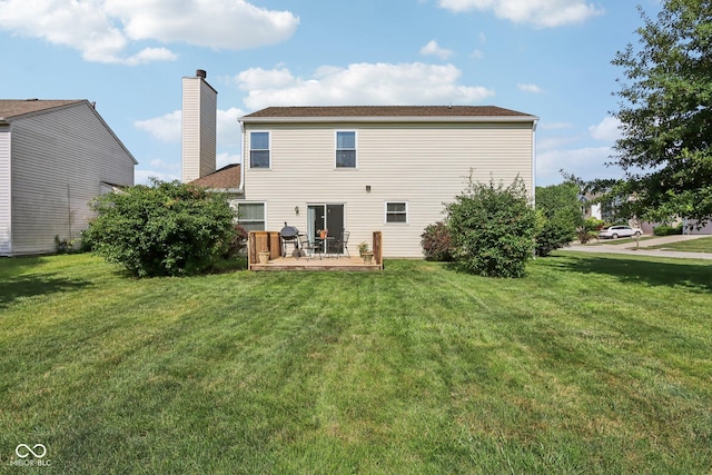 6711 Crestwell Ln, Indianapolis, IN 46268 - back of property featuring a yard and a chimney