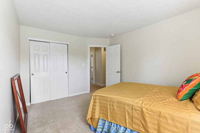 6711 Crestwell Ln, Indianapolis, IN 46268 - carpeted bedroom featuring a closet and baseboards