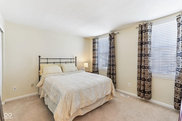 6711 Crestwell Ln, Indianapolis, IN 46268 - bedroom with carpet and baseboards