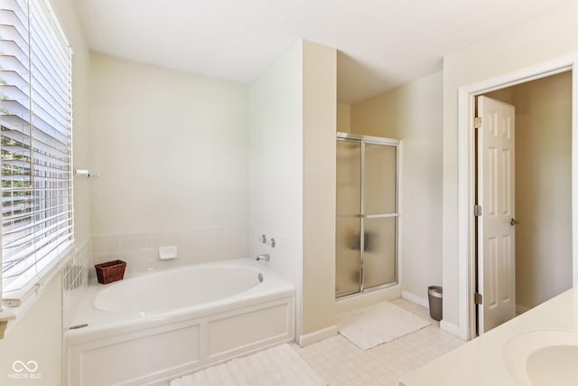 6711 Crestwell Ln, Indianapolis, IN 46268 - full bath featuring a bath, a stall shower, tile patterned floors, and vanity
