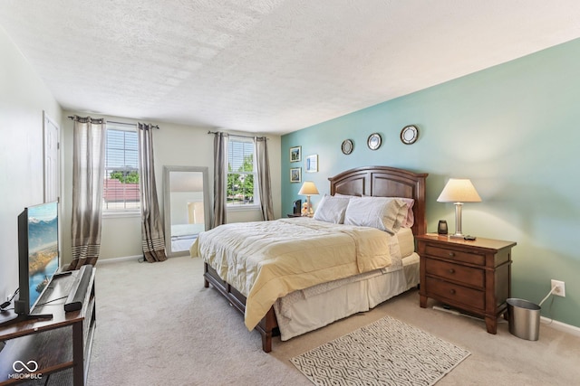 6711 Crestwell Ln, Indianapolis, IN 46268 - bedroom featuring light colored carpet and a textured ceiling