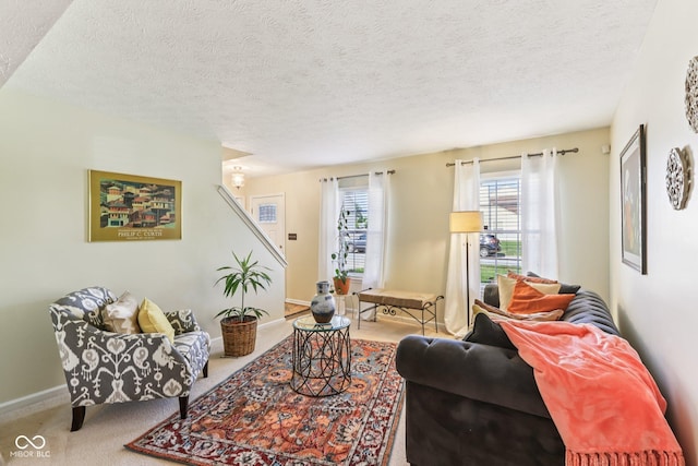 6711 Crestwell Ln, Indianapolis, IN 46268 - carpeted living room with a textured ceiling