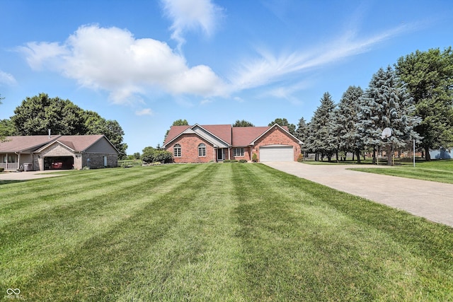 8030 5 Points Rd, Indianapolis, IN 46259 - ranch-style home with driveway, a garage, a front yard, and brick siding