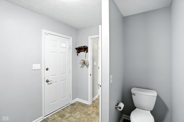 8030 5 Points Rd, Indianapolis, IN 46259 - bathroom with toilet and a textured ceiling