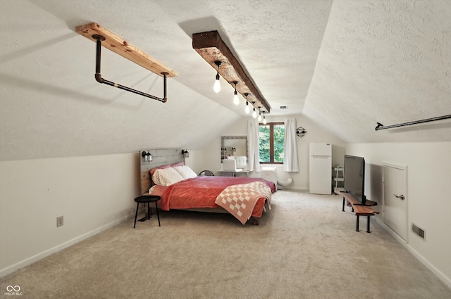8030 5 Points Rd, Indianapolis, IN 46259 - carpeted bedroom featuring freestanding refrigerator, a textured ceiling, and vaulted ceiling