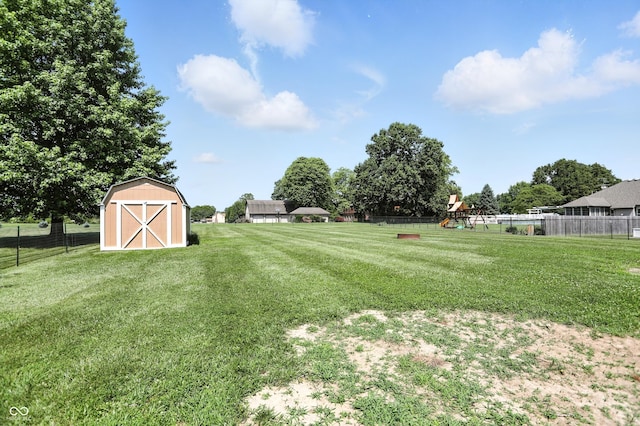 8030 5 Points Rd, Indianapolis, IN 46259 - view of yard featuring a playground and a storage unit