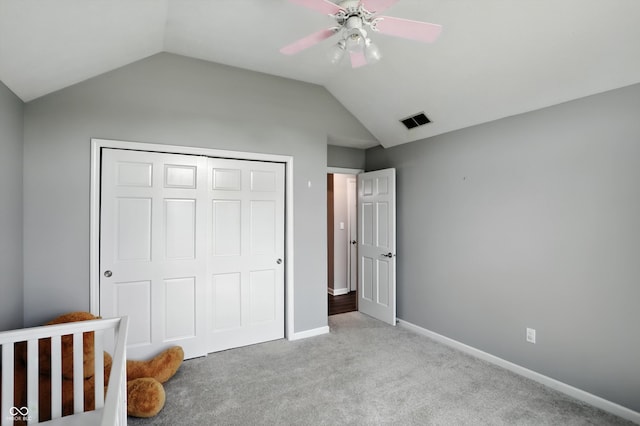 8030 5 Points Rd, Indianapolis, IN 46259 - unfurnished bedroom with lofted ceiling, carpet flooring, a closet, and a ceiling fan