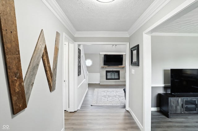 8030 5 Points Rd, Indianapolis, IN 46259 - hall featuring wood finished floors, a textured ceiling, and crown molding