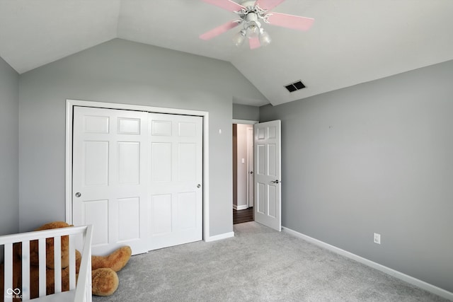 8030 5 Points Rd, Indianapolis, IN 46259 - unfurnished bedroom with vaulted ceiling, carpet flooring, a closet, and ceiling fan