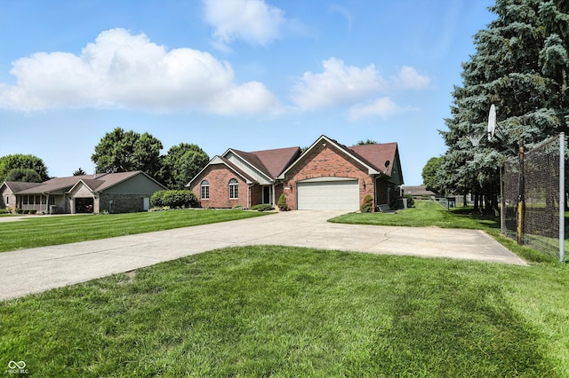 8030 5 Points Rd, Indianapolis, IN 46259 - ranch-style home with brick siding, a garage, and concrete driveway