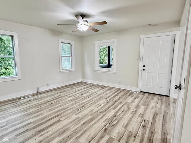 3712 S Kealing Ave S, Indianapolis, IN 46237 - spare room with plenty of natural light, ceiling fan, and light wood-type flooring