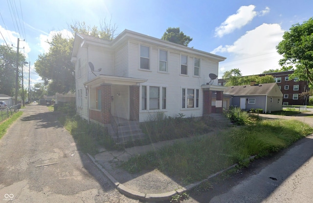 7 N Colorado Ave, Indianapolis, IN 46201 - view of front facade with brick siding