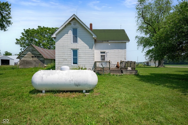 5396 N 1000 E, Sheridan, IN 46069 - back of property featuring a deck, a chimney, and a lawn