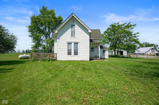 5396 N 1000 E, Sheridan, IN 46069 - rear view of house featuring a lawn and a deck