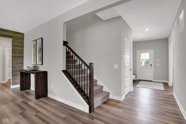 5343 Pelion Pl, Mccordsville, IN 46055 - entrance foyer with wood finished floors, stairway, and recessed lighting