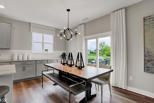 5343 Pelion Pl, Mccordsville, IN 46055 - dining space with wood finished floors and a chandelier