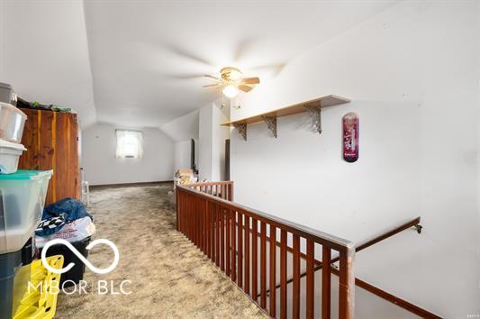 2410 S Ebright St, Muncie, IN 47302 - corridor with carpet and vaulted ceiling