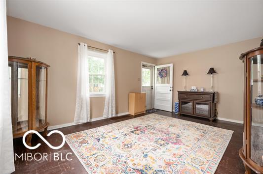 2410 S Ebright St, Muncie, IN 47302 - bedroom featuring baseboards and wood finished floors