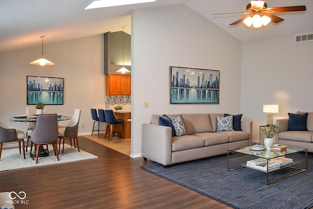 112 Marble Arch Way, Lafayette, IN 47905 - living room featuring dark wood finished floors, a ceiling fan, and high vaulted ceiling