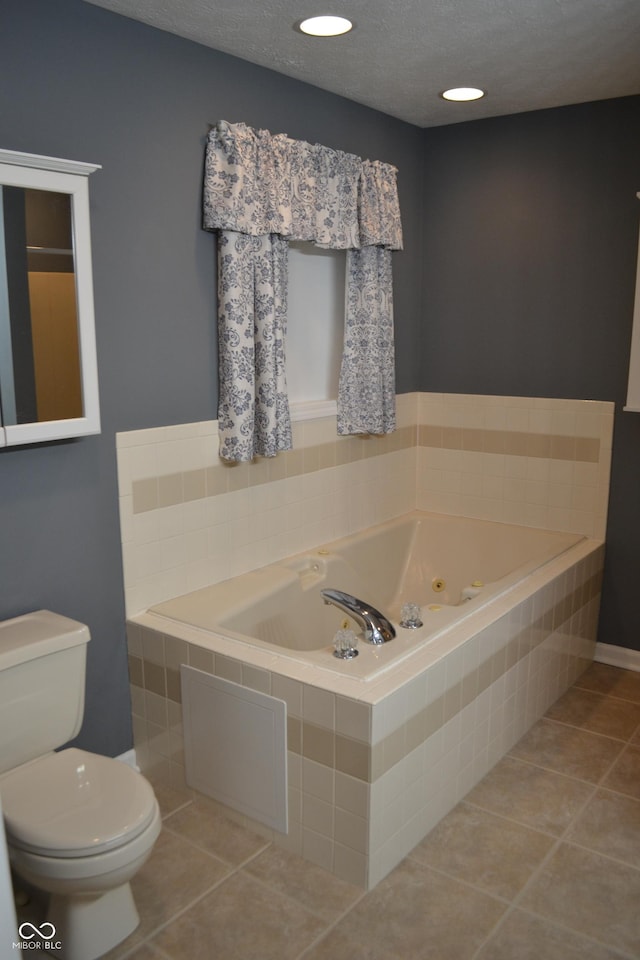 112 Marble Arch Way, Lafayette, IN 47905 - full bath featuring tile patterned floors, a tub with jets, and a textured ceiling