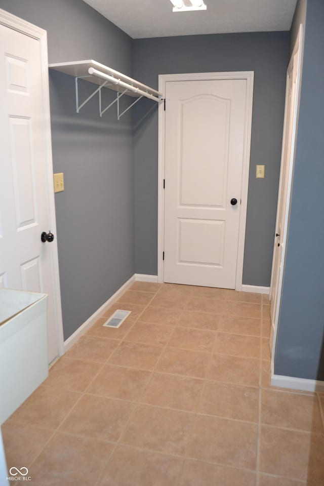 112 Marble Arch Way, Lafayette, IN 47905 - laundry area with light tile patterned floors and baseboards
