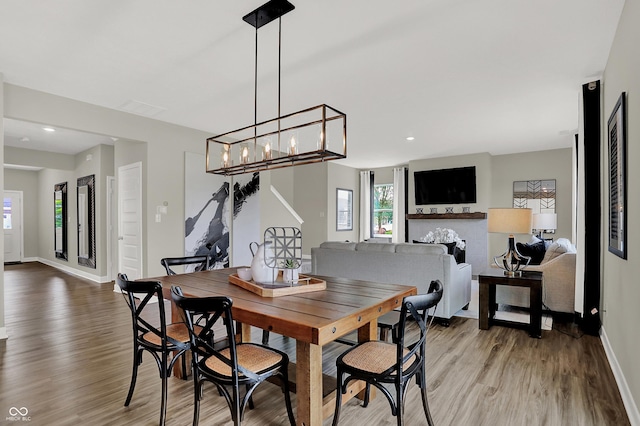 19838 Moorpark Lndg, Noblesville, IN 46062 - dining space featuring light wood-style flooring, recessed lighting, and a chandelier