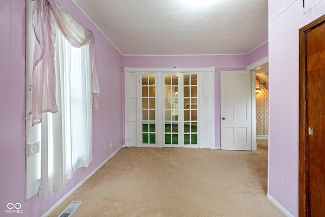 206 E Franklin St, Roachdale, IN 46172 - unfurnished room featuring light colored carpet and a textured ceiling
