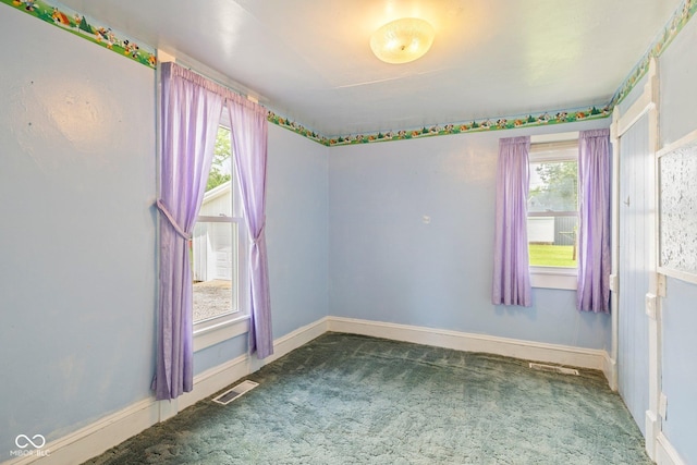 206 E Franklin St, Roachdale, IN 46172 - unfurnished room with carpet floors and plenty of natural light