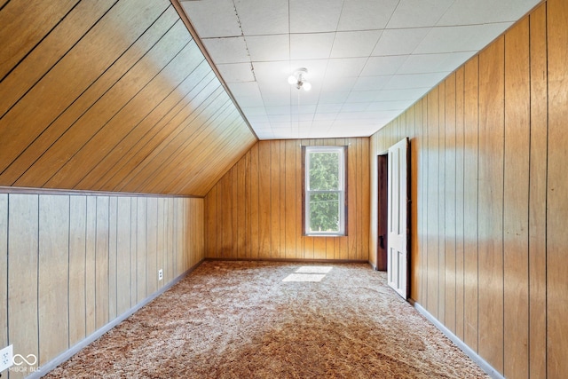206 E Franklin St, Roachdale, IN 46172 - additional living space with carpet floors, wood walls, and lofted ceiling