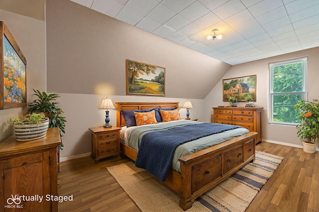 206 E Franklin St, Roachdale, IN 46172 - bedroom featuring hardwood / wood-style flooring and lofted ceiling