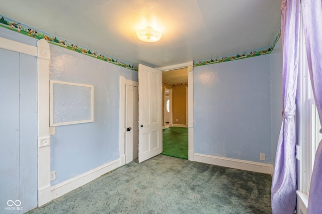 206 E Franklin St, Roachdale, IN 46172 - unfurnished bedroom with carpet floors and baseboards