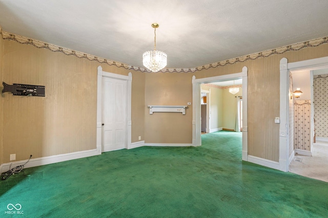 206 E Franklin St, Roachdale, IN 46172 - carpeted empty room with a chandelier and baseboards