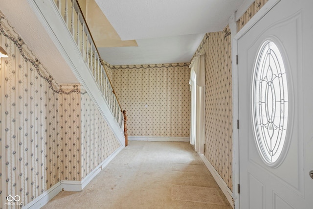 206 E Franklin St, Roachdale, IN 46172 - carpeted entryway featuring wallpapered walls