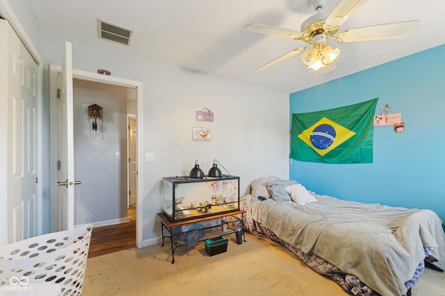 1439 E Mckenzie Rd, Greenfield, IN 46140 - carpeted bedroom featuring a closet and ceiling fan