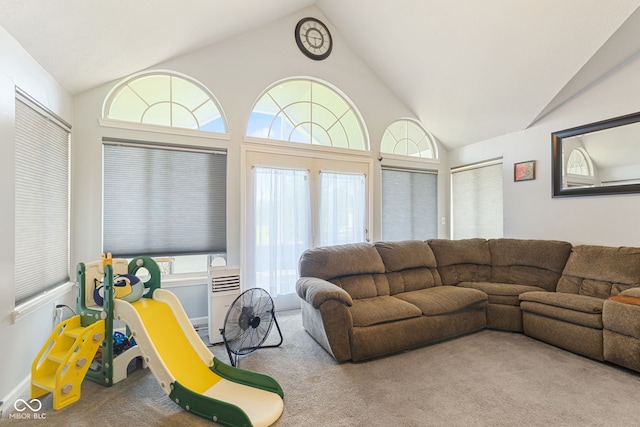 1439 E Mckenzie Rd, Greenfield, IN 46140 - carpeted living room featuring vaulted ceiling and healthy amount of natural light
