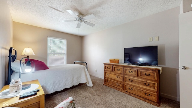6816 Minnow Dr, Indianapolis, IN 46237 - bedroom with a textured ceiling, carpet, and a ceiling fan