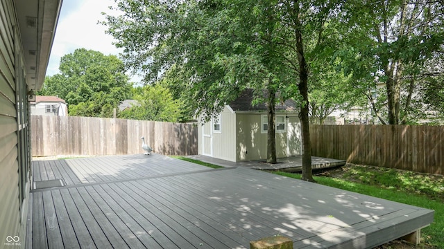 6816 Minnow Dr, Indianapolis, IN 46237 - deck with a fenced backyard and a storage shed