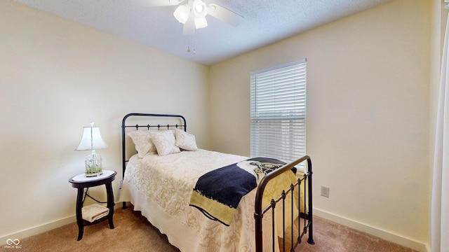 6816 Minnow Dr, Indianapolis, IN 46237 - carpeted bedroom featuring baseboards and a ceiling fan