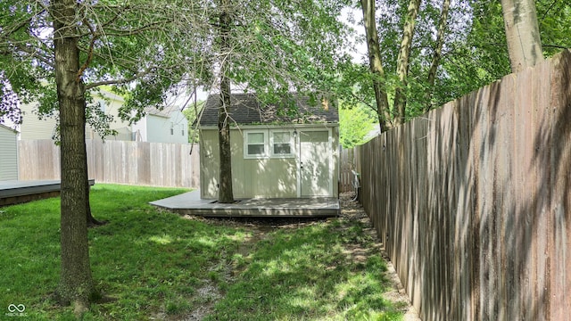 6816 Minnow Dr, Indianapolis, IN 46237 - fenced backyard with a storage unit
