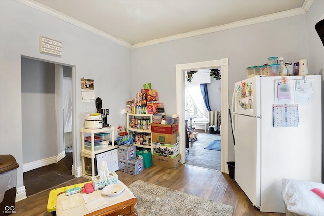 315 N High St, Hartford City, IN 47348 - living area featuring crown molding and wood finished floors