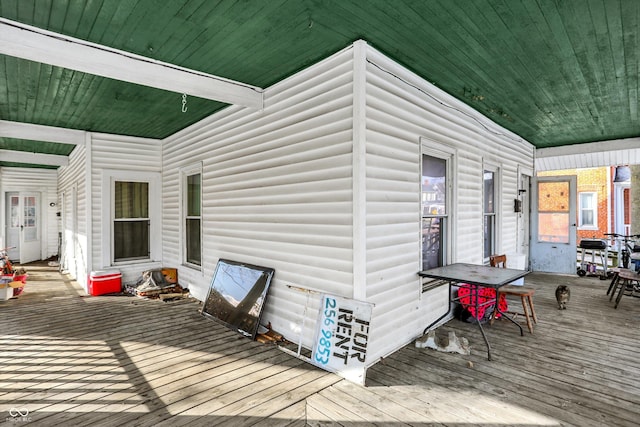 315 N High St, Hartford City, IN 47348 - wooden terrace with outdoor dining area