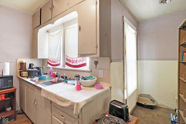 315 N High St, Hartford City, IN 47348 - kitchen featuring black microwave, tile countertops, and wall oven