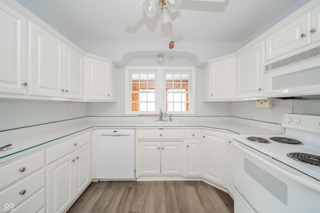 171 Nursery Rd, Anderson, IN 46012 - kitchen with white appliances, a ceiling fan, wood finished floors, light countertops, and white cabinetry