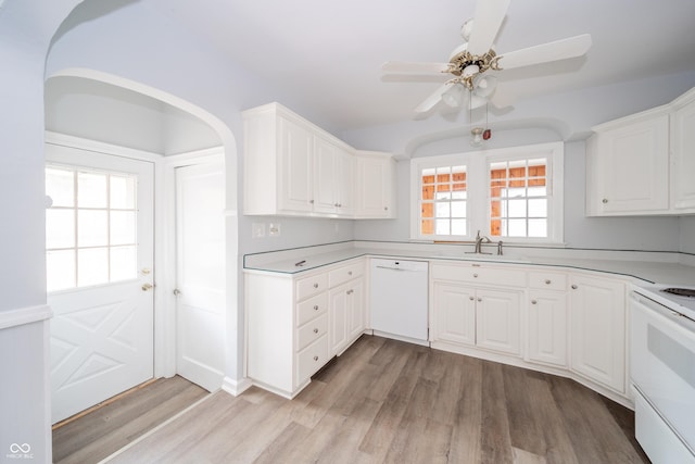 171 Nursery Rd, Anderson, IN 46012 - kitchen with white appliances, white cabinets, light wood finished floors, ceiling fan, and light countertops