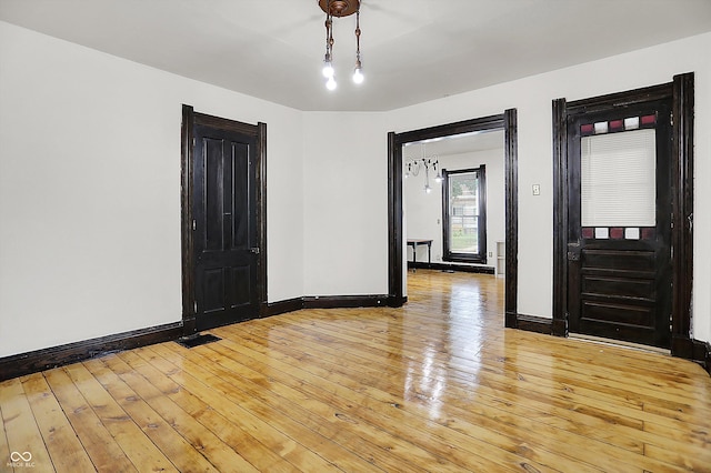 115 Simpson St, Crawfordsville, IN 47933 - empty room featuring light wood finished floors and baseboards